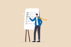 Illustration of a person checking off deliverables on a self-hosted LMS project checklist