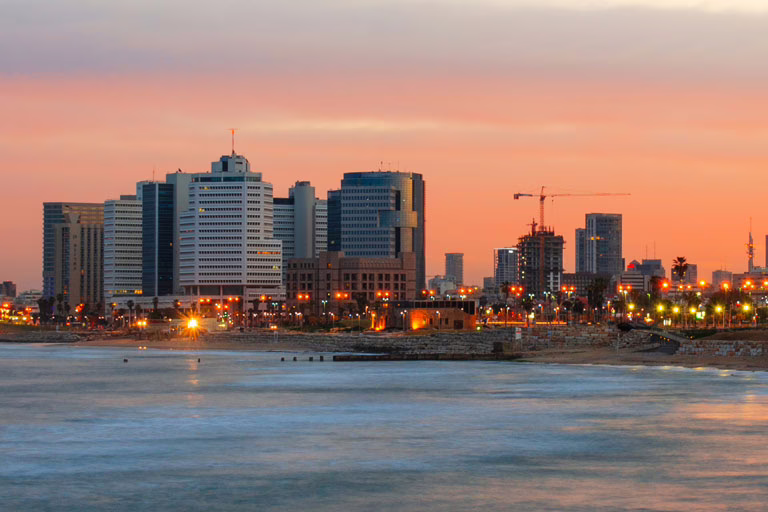 Tel Aviv skyline at dusk, representing resilient WordPress hosting infrastructure with failover support in Israel